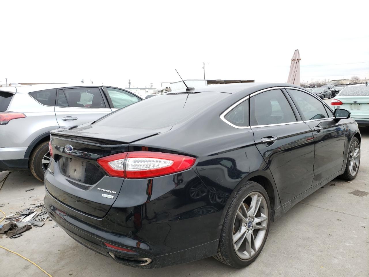 Photo 4 from auction – 2016 FORD FUSION TIT with VIN 3FA6P0K90GR172241