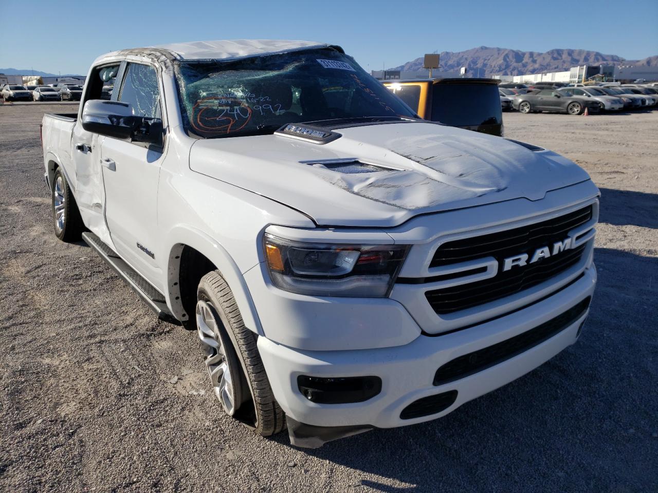 RAM 1500 LARAM 2021 with VIN 1C6SRFJT7MN603599 - Photo from auction