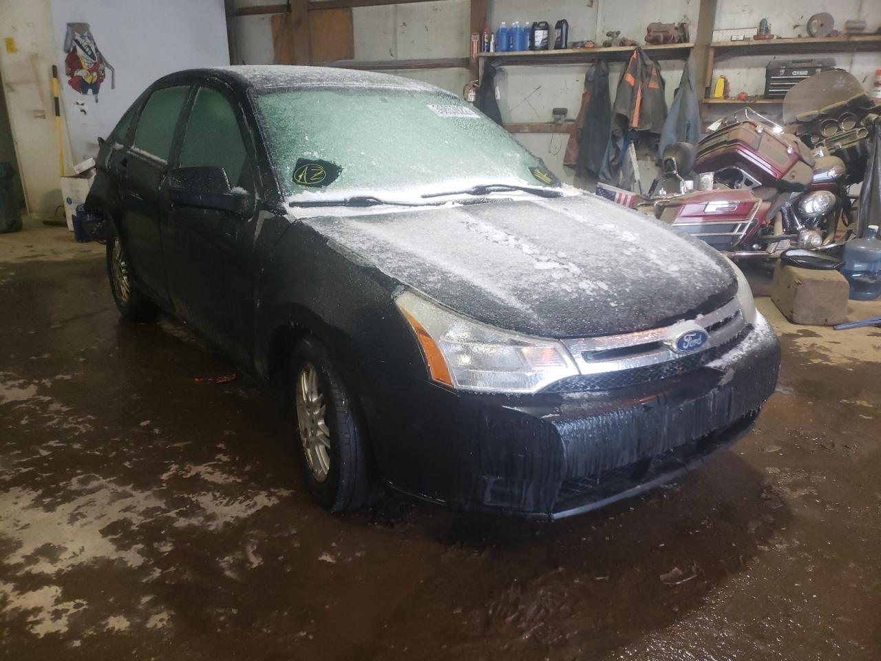 FORD FOCUS 2011 with VIN 1FAHP3FN2BW144142 - Photo from auction