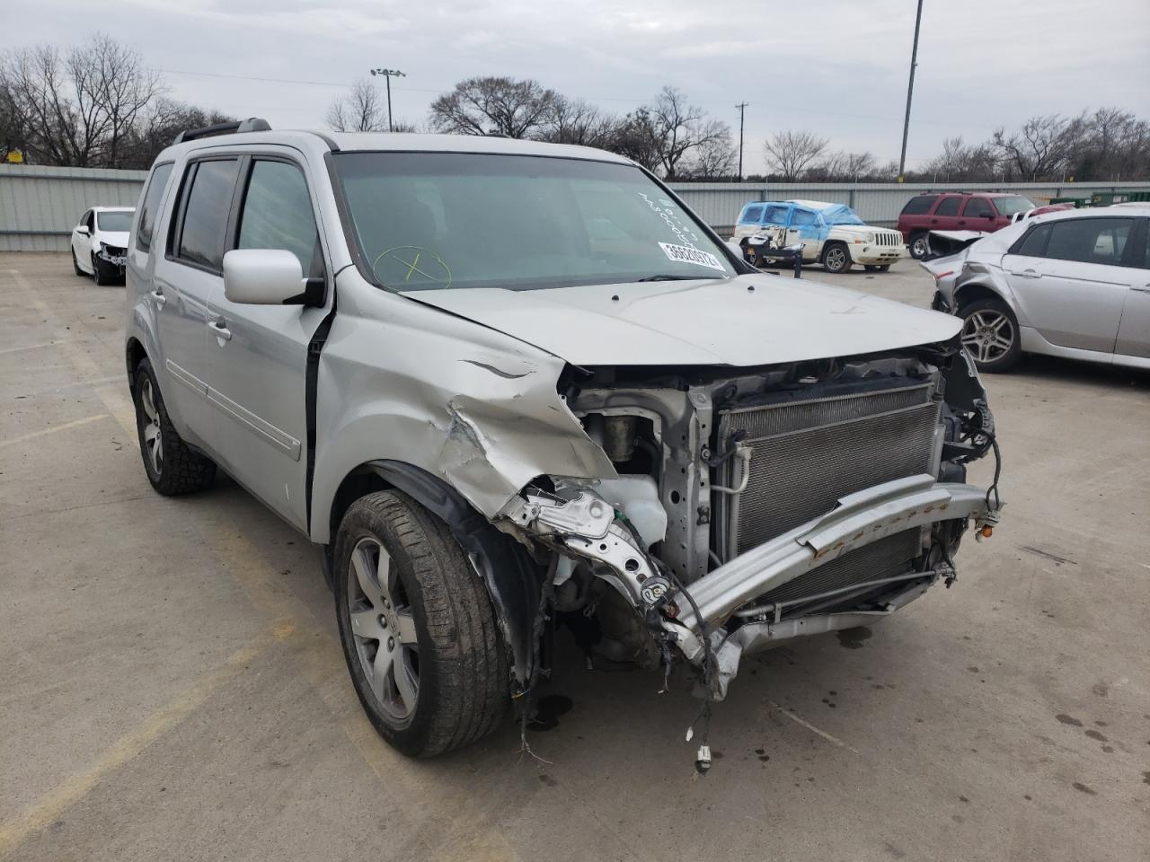 HONDA PILOT TOUR 2012 with VIN 5FNYF3H97CB013629 - Photo from auction
