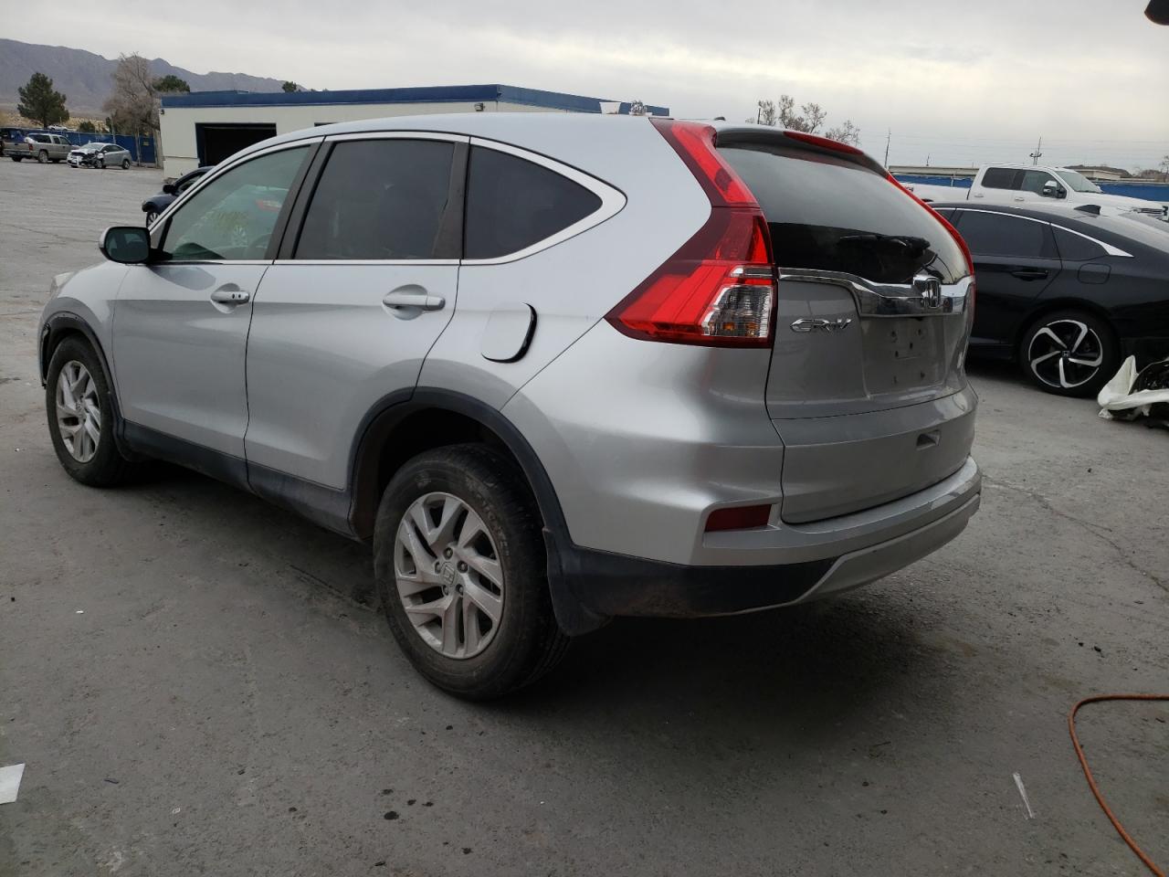Photo 3 from auction – 2015 HONDA CR-V EX with VIN 3CZRM3H55FG700267