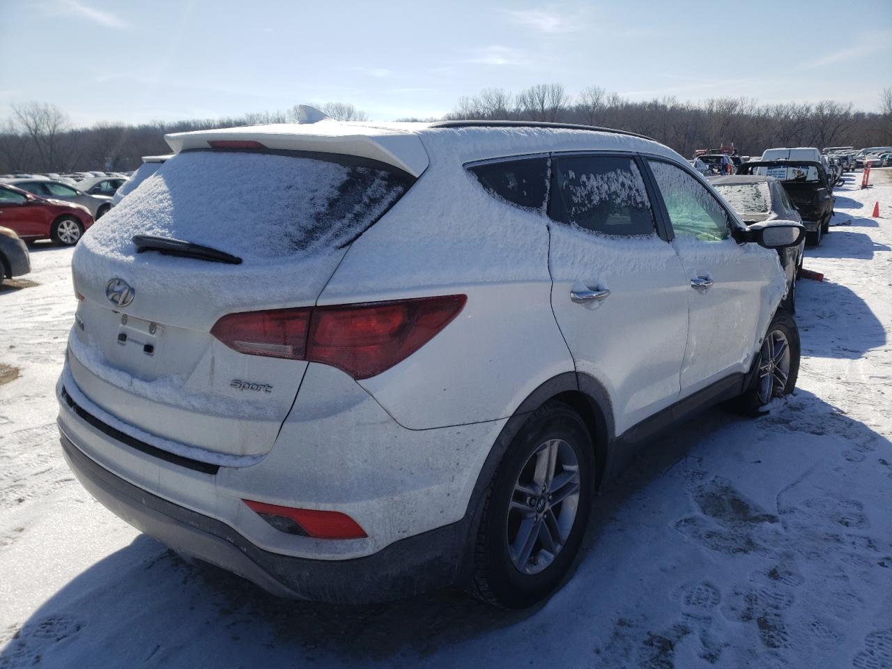 Photo 4 from auction – 2017 HYUNDAI SANTA FE S with VIN 5NMZU3LB1HH005987