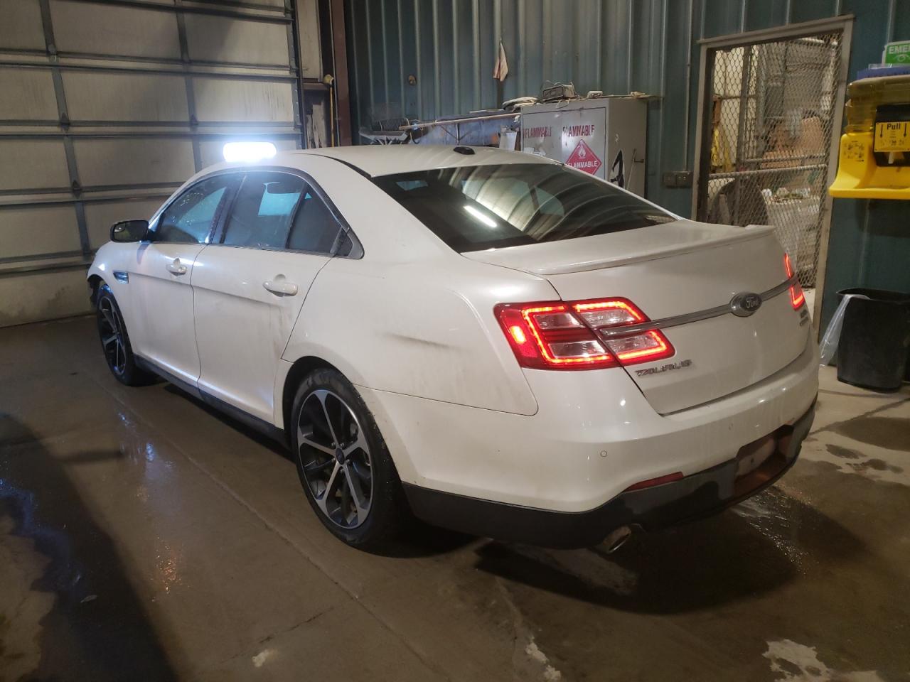 Photo 3 from auction – 2015 FORD TAURUS SEL with VIN 1FAHP2E89FG206643