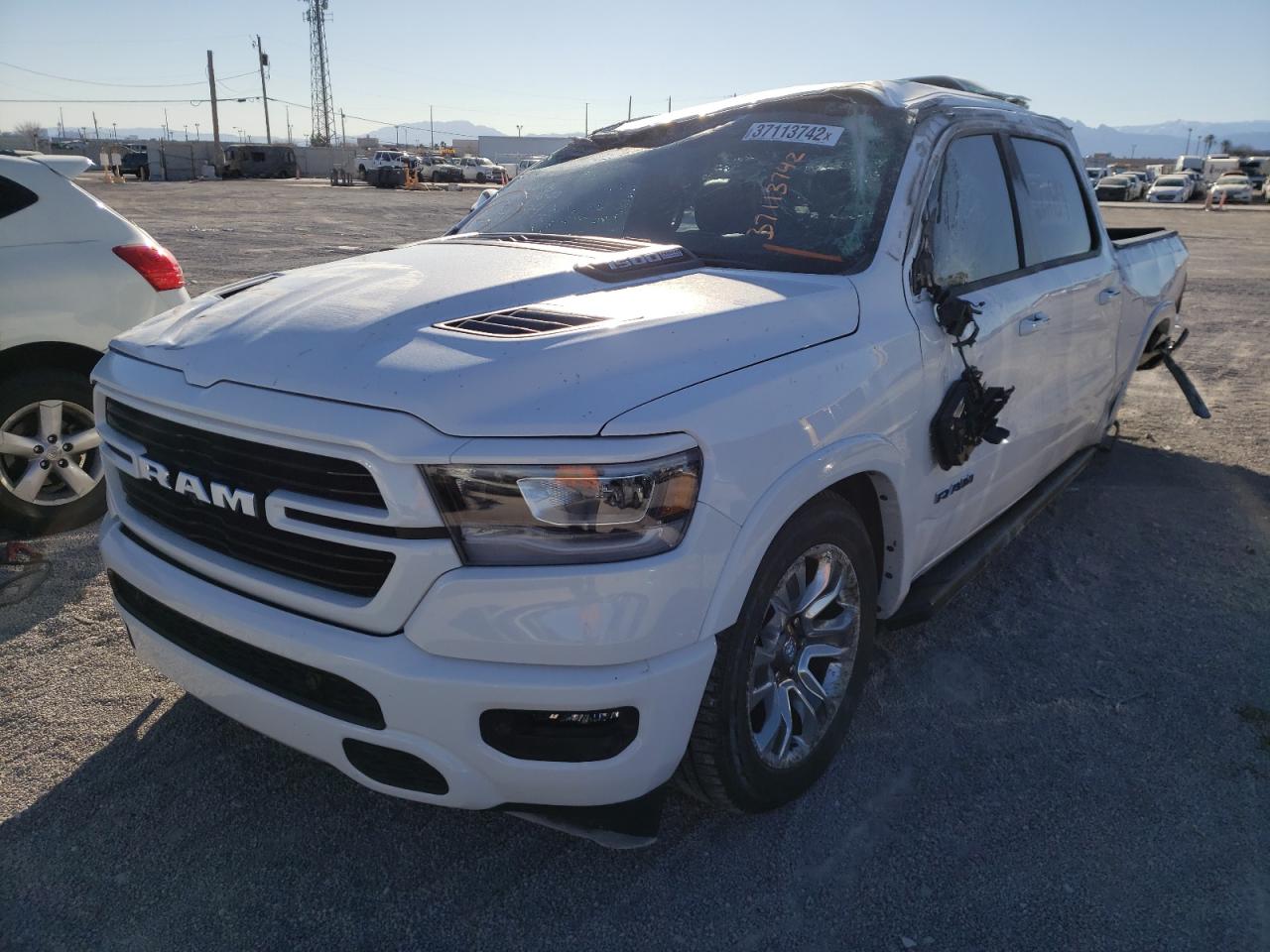 Photo 2 from auction – 2021 RAM 1500 LARAM with VIN 1C6SRFJT7MN603599
