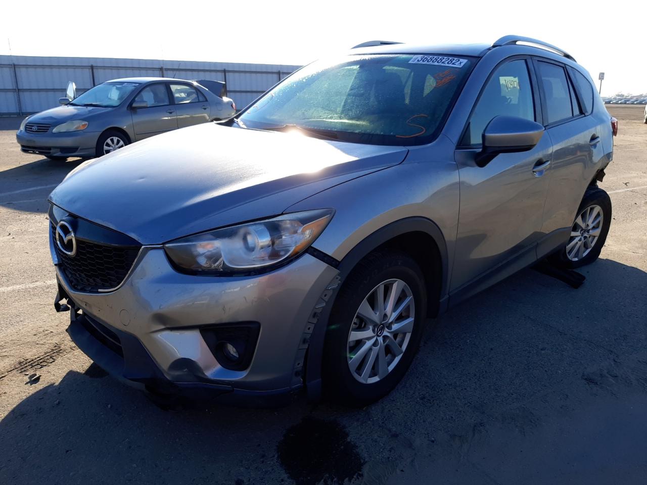Photo 2 from auction – 2014 MAZDA CX-5 TOURI with VIN JM3KE2CY0E0306296