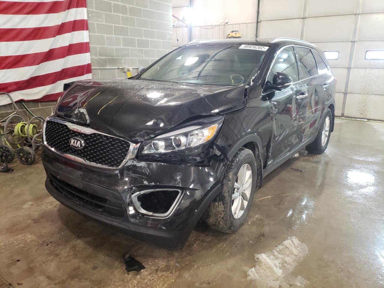 Photo 2 from auction – 2016 KIA SORENTO LX with VIN 5XYPGDA37GG075017