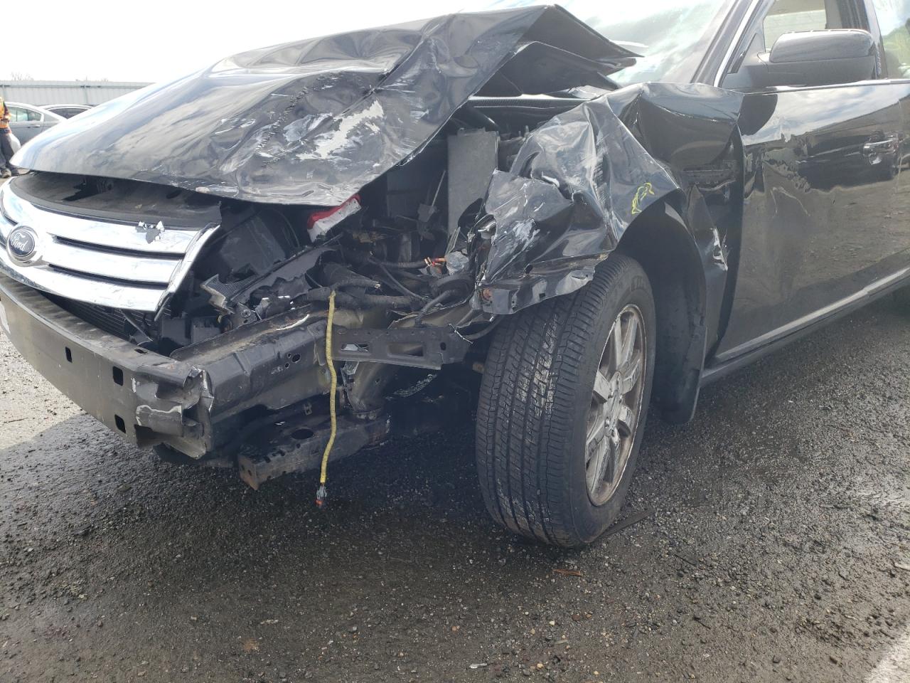Photo 9 from auction – 2008 FORD TAURUS with VIN 1FAHP24WX8G182002