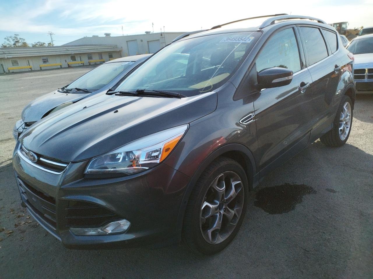 Photo 2 from auction – 2016 FORD ESCAPE TIT with VIN 1FMCU0J9XGUA40079