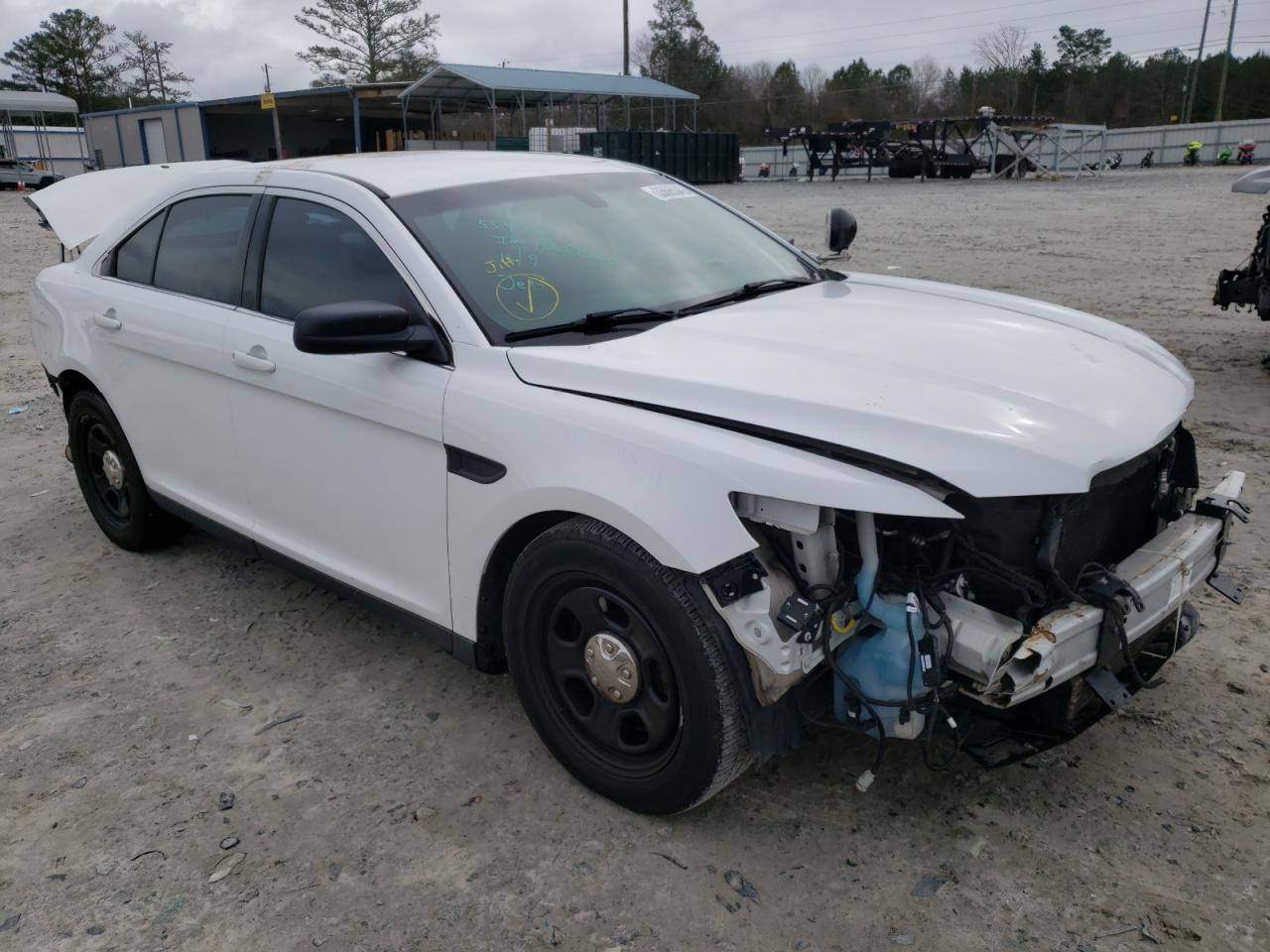 FORD TAURUS POL 2015 with VIN 1FAHP2MT5FG115049 - Photo from auction