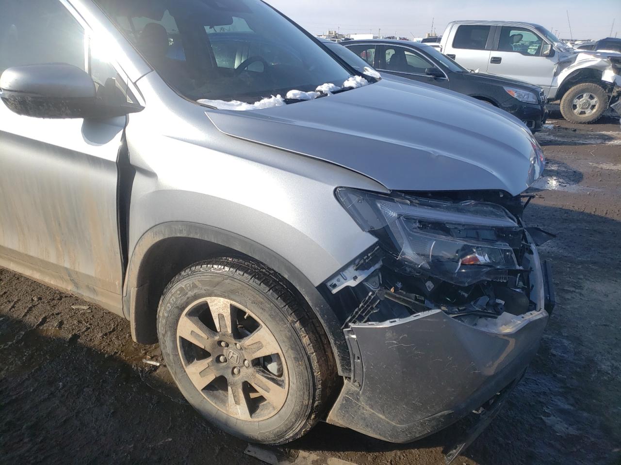Photo 9 from auction – 2020 HONDA RIDGELINE with VIN 5FPYK3F55LB029282