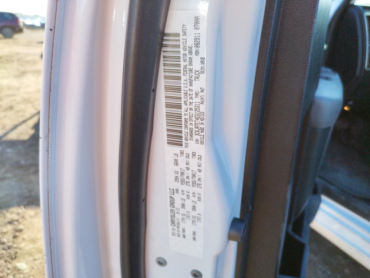 Photo 10 from auction – 2014 RAM 1500 SLT with VIN 3C6JR7ET4EG125311