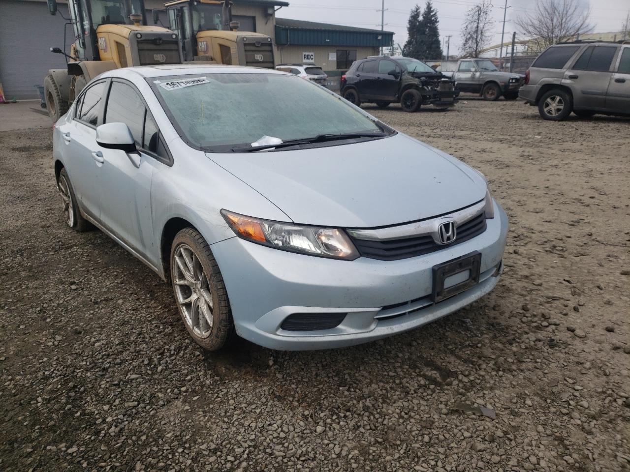 HONDA CIVIC EXL 2012 with VIN 2HGFB2F94CH528034 - Photo from auction