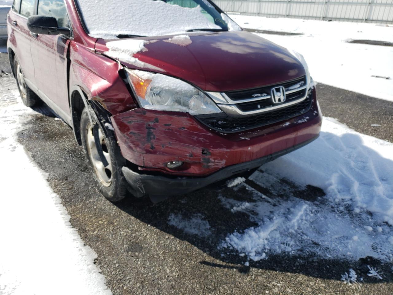 Photo 9 from auction – 2011 HONDA CR-V LX with VIN 5J6RE4H30BL033686