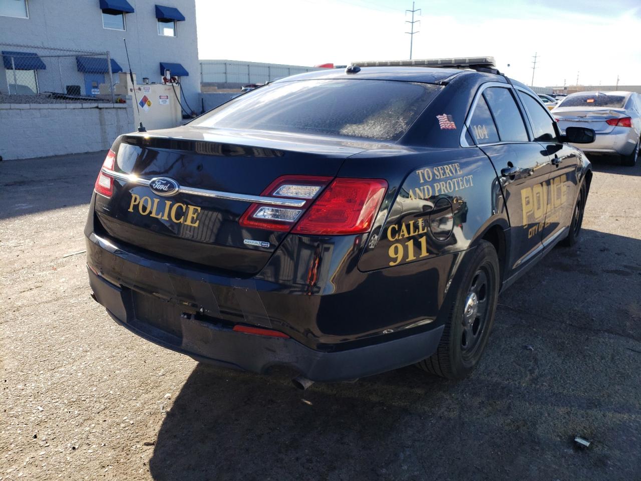 Photo 4 from auction – 2015 FORD TAURUS POL with VIN 1FAHP2MK7FG182050