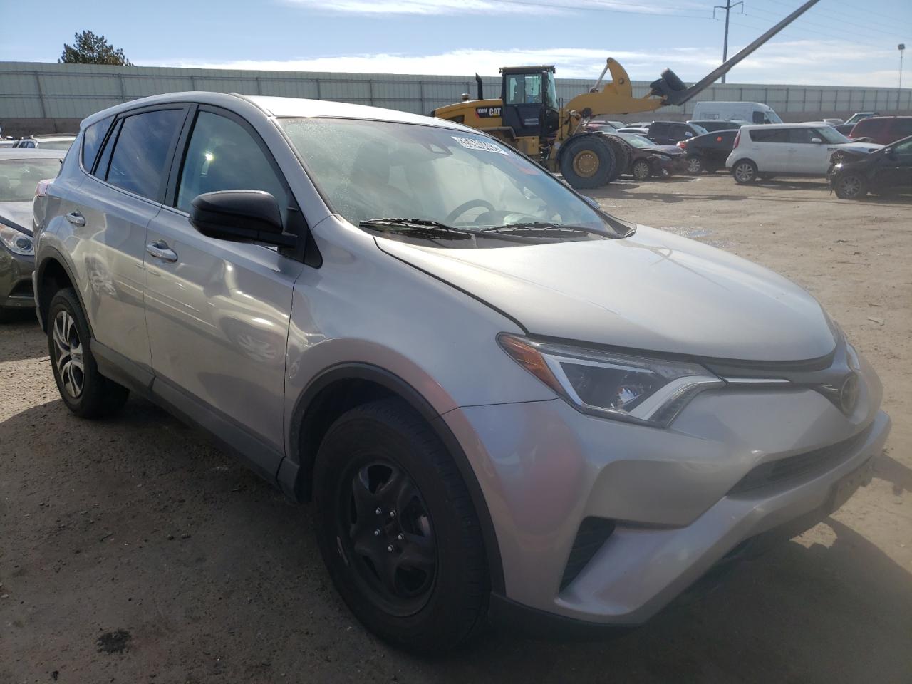 Photo 1 from auction – 2018 TOYOTA RAV4 LE with VIN 2T3BFREV9JW760778