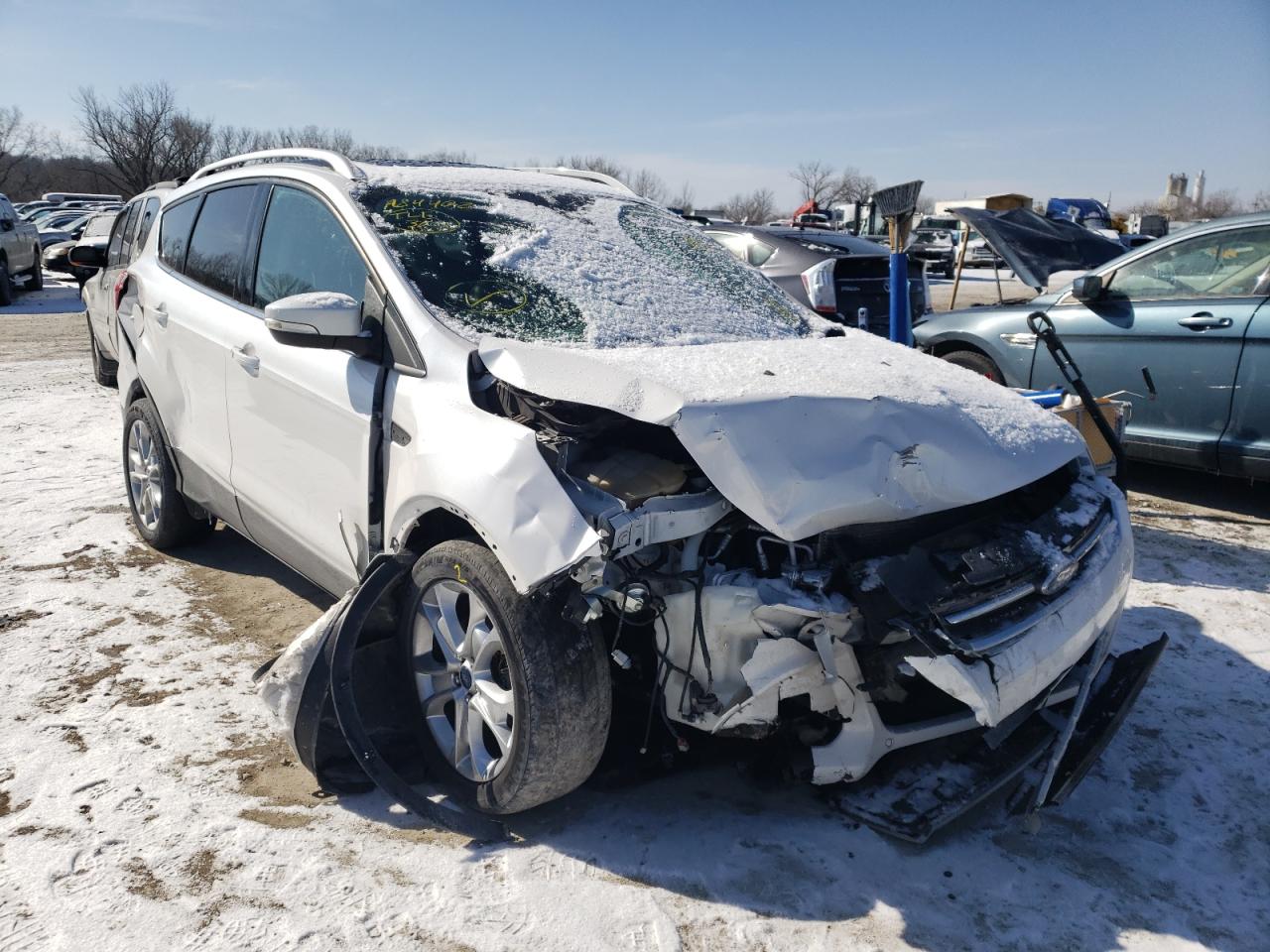 FORD ESCAPE TIT 2016 with VIN 1FMCU9J97GUA84402 - Photo from auction