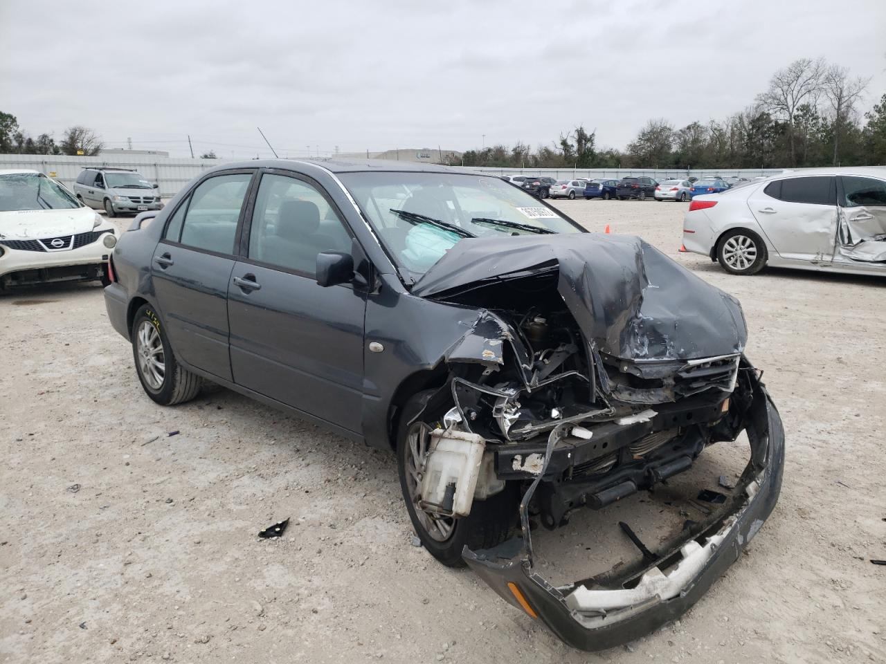 MITSUBISHI LANCER ES 2003 with VIN JA3AJ26E53U109159 - Photo from auction