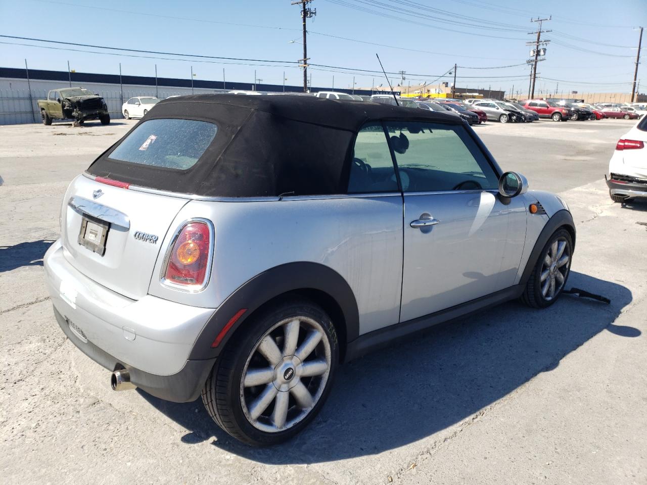 Photo 4 from auction – 2009 MINI COOPER with VIN WMWMR33599TU95792