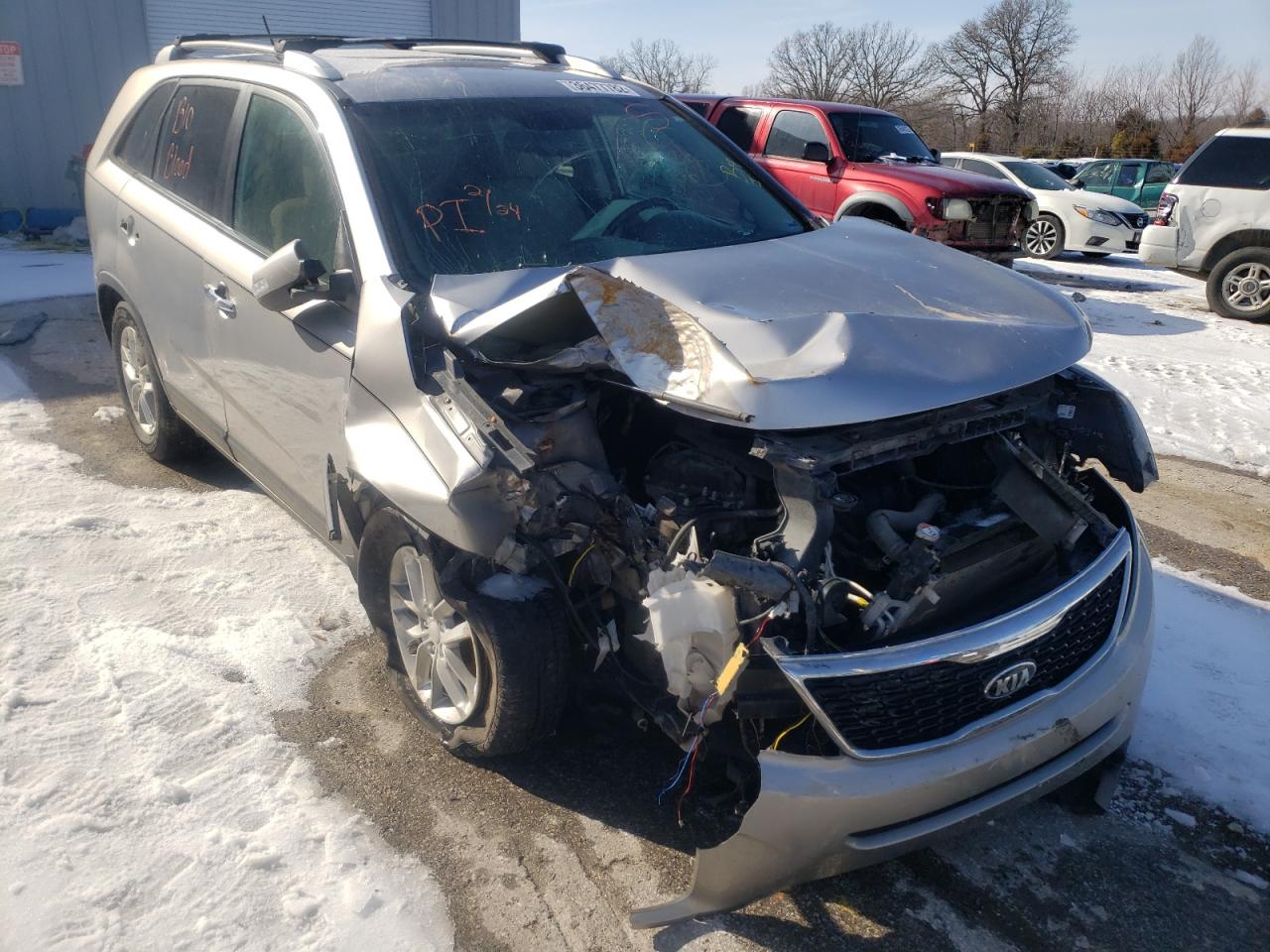 KIA SORENTO LX 2014 with VIN 5XYKT4A63EG525906 - Photo from auction
