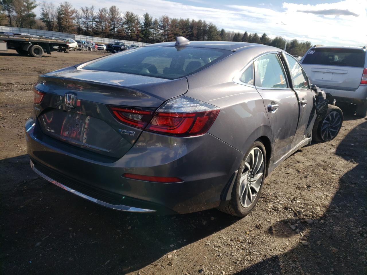 Photo 4 from auction – 2020 HONDA INSIGHT TO with VIN 19XZE4F98LE001060