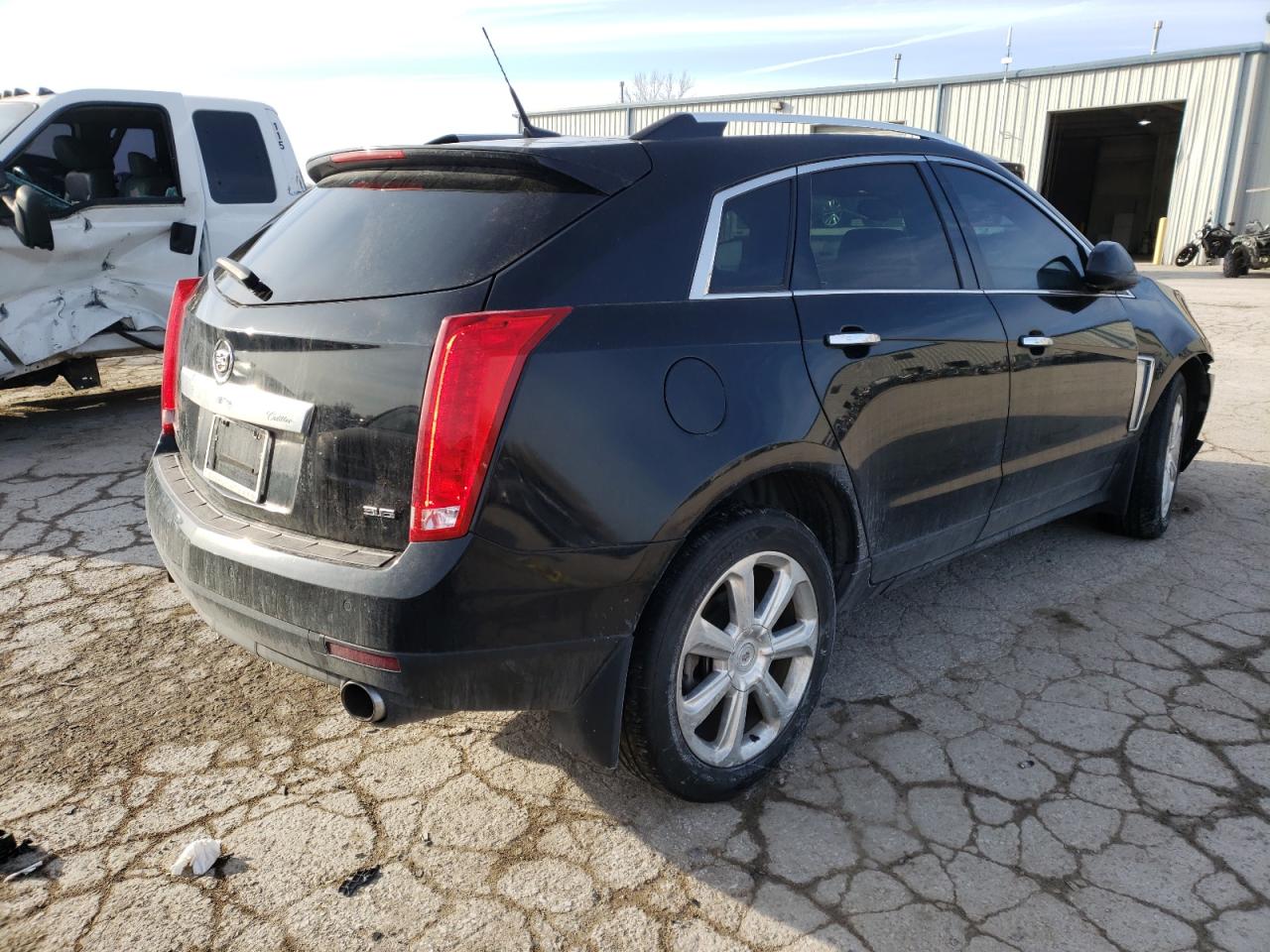 Photo 4 from auction – 2013 CADILLAC SRX PERFOR with VIN 3GYFNDE34DS635933