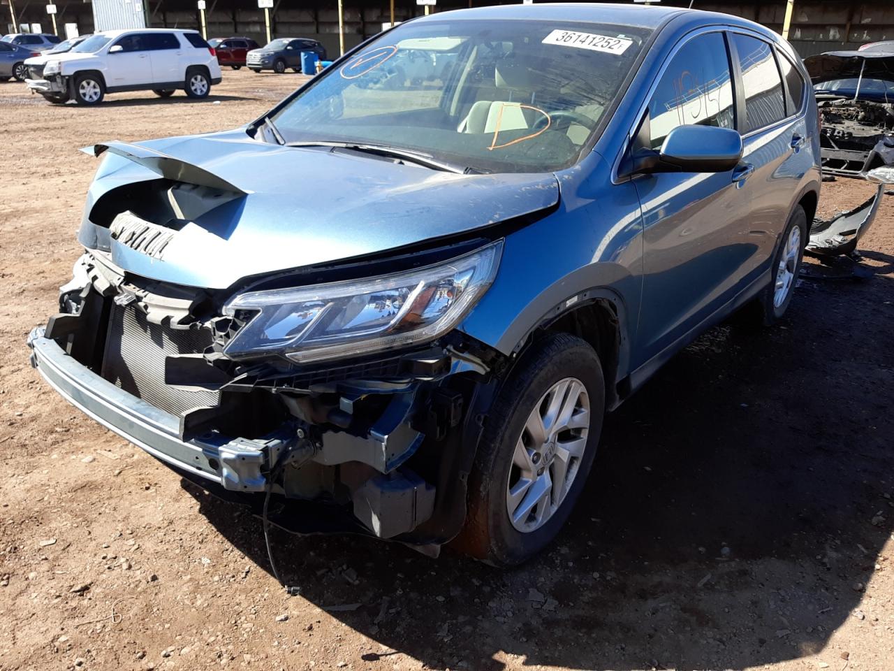 Photo 2 from auction – 2015 HONDA CR-V EX with VIN 2HKRM3H50FH547021