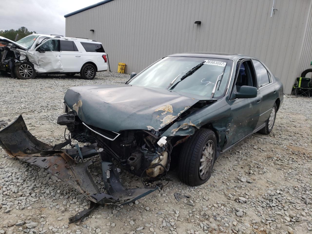 Photo 2 from auction – 1997 HONDA ACCORD EX with VIN 1HGCD5657VA013588