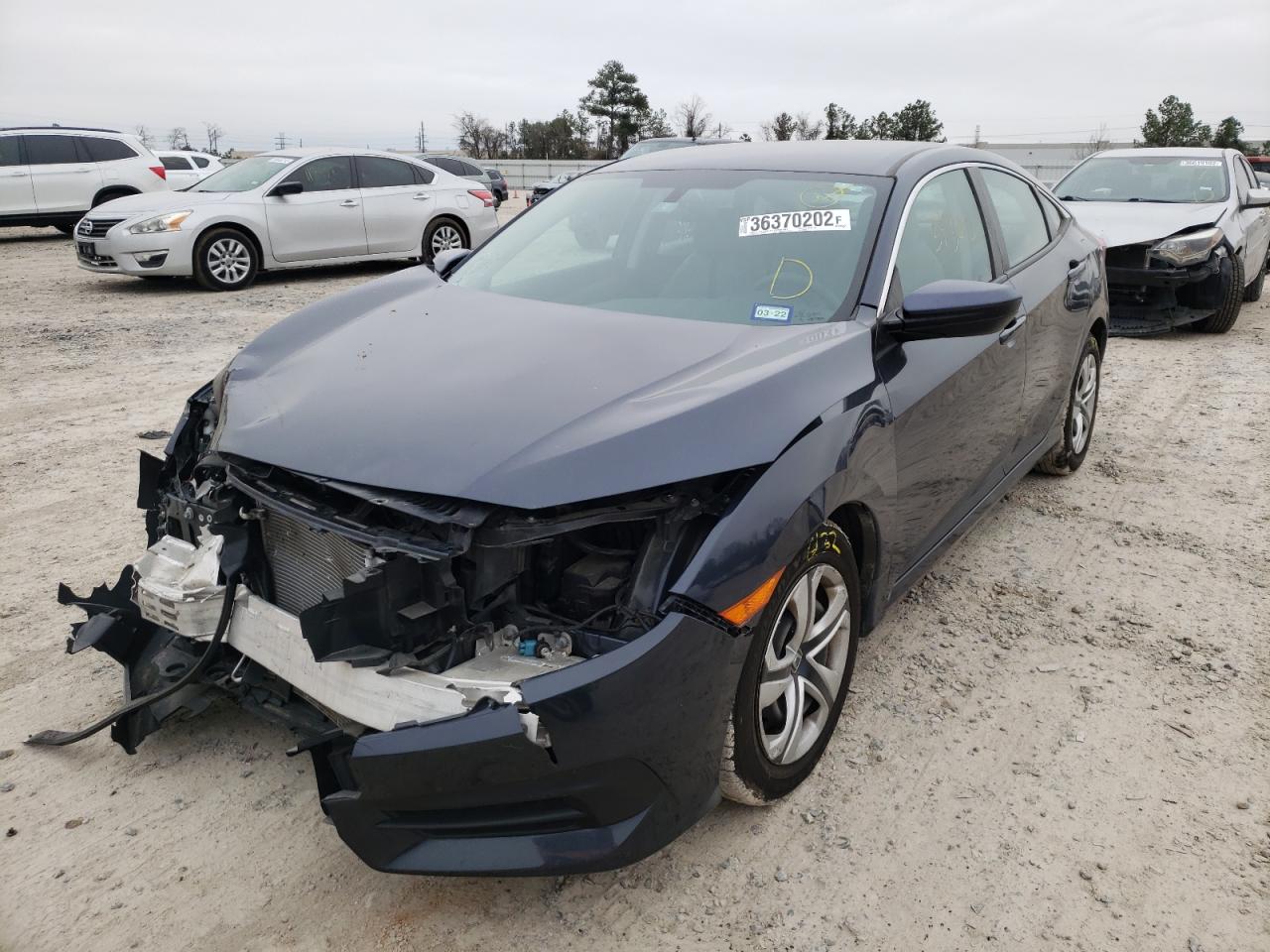 Photo 2 from auction – 2017 HONDA CIVIC LX with VIN 19XFC2F58HE029913