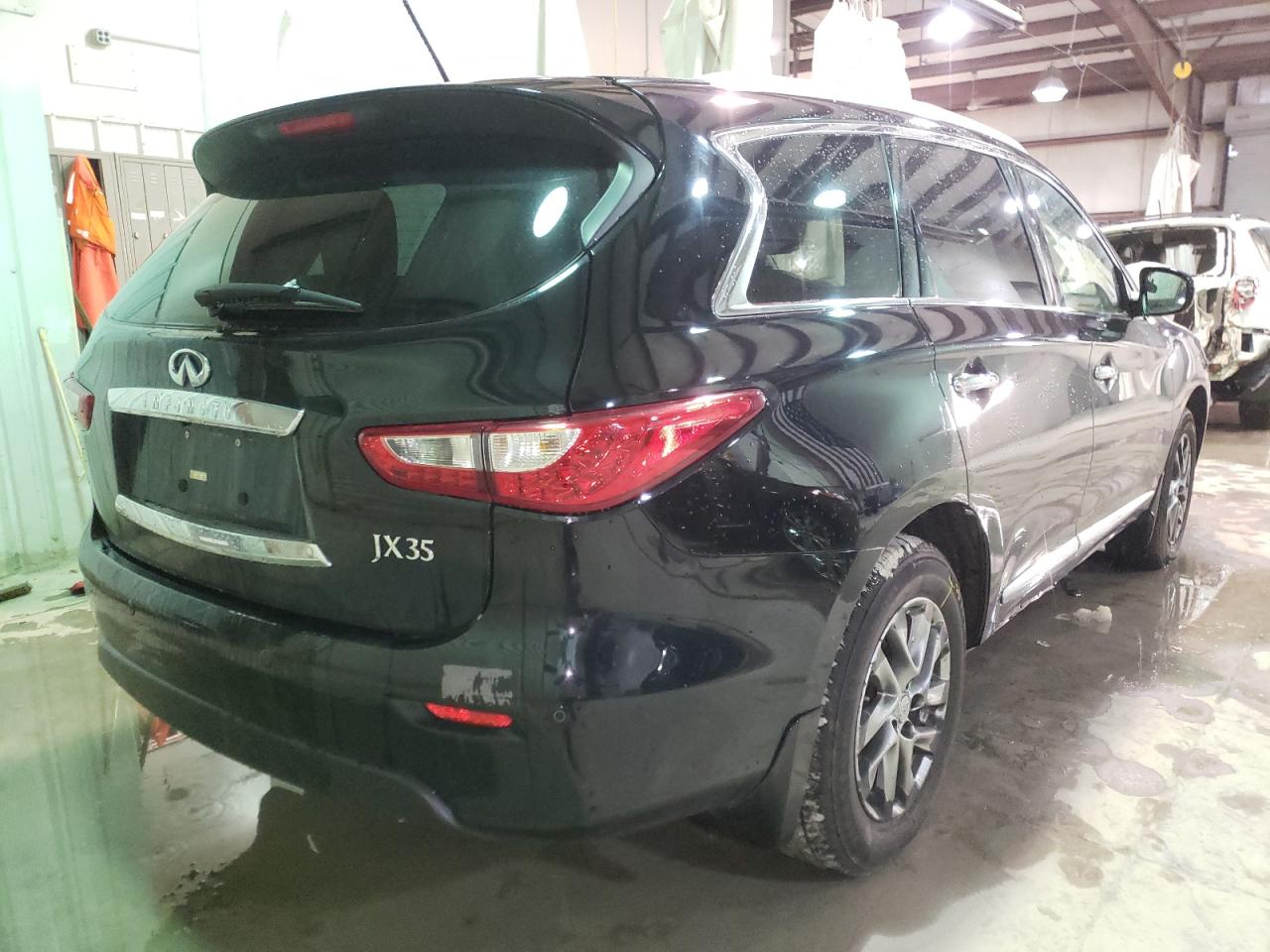 Photo 4 from auction – 2013 INFINITI JX35 with VIN 5N1AL0MM7DC317072