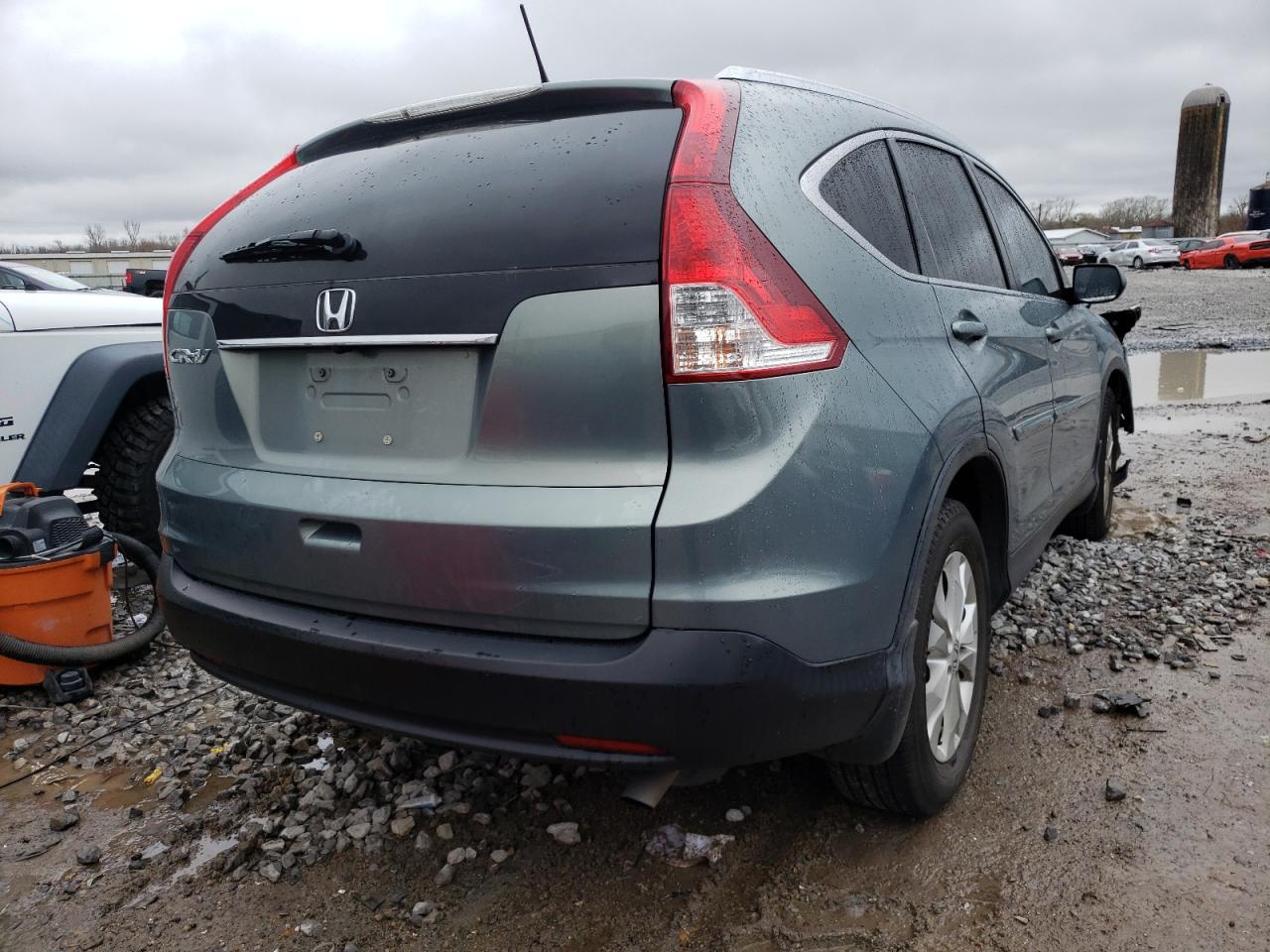 Photo 4 from auction – 2012 HONDA CR-V EXL with VIN JHLRM3H78CC000865