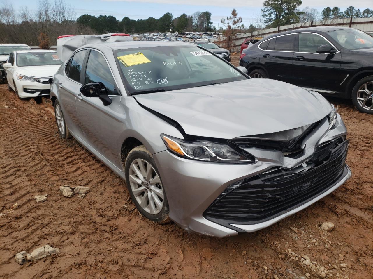 TOYOTA CAMRY LE 2020 with VIN 4T1C11AK2LU957593 - Photo from auction