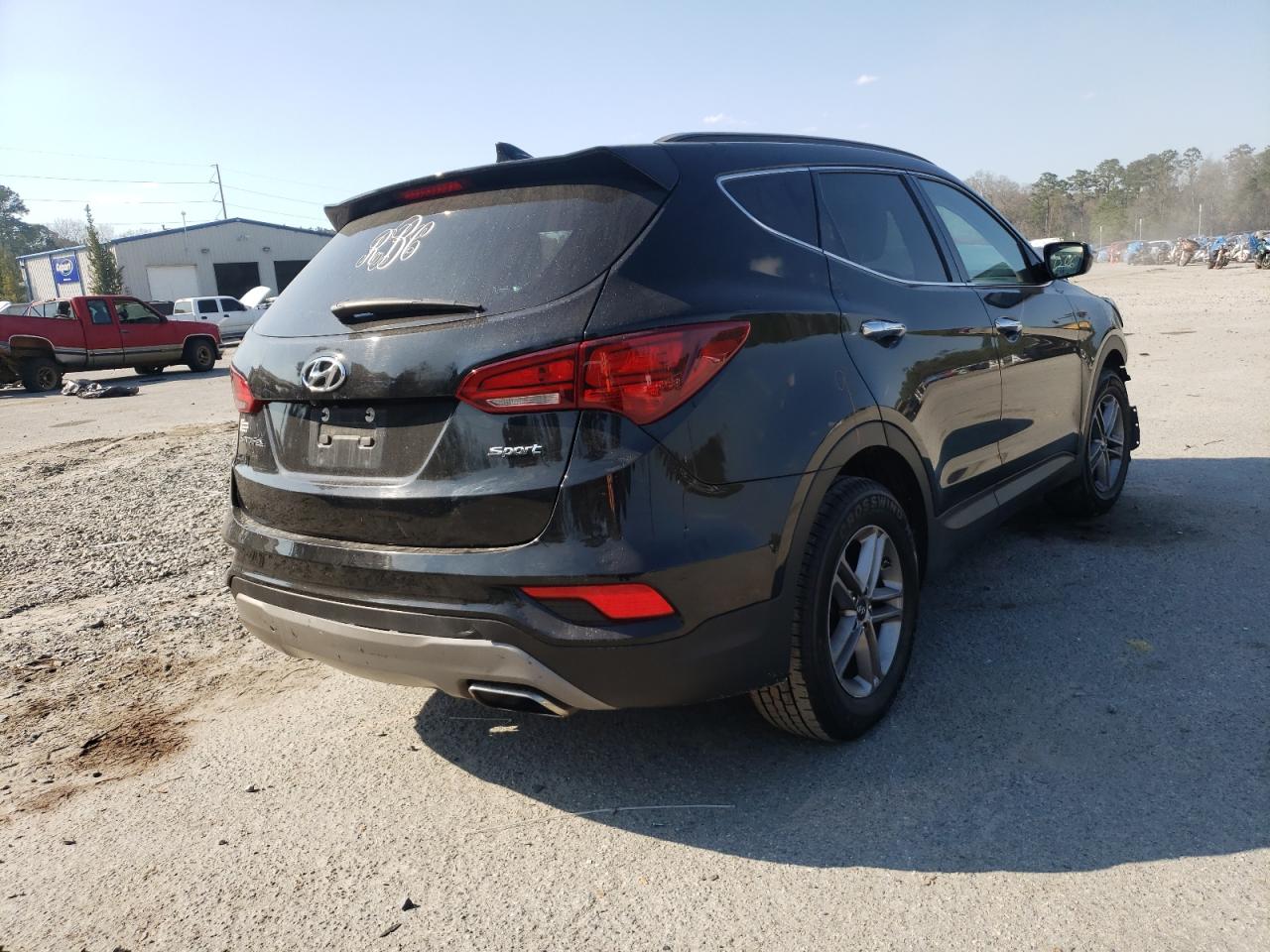 Photo 4 from auction – 2017 HYUNDAI SANTA FE S with VIN 5NMZU3LB1HH025673