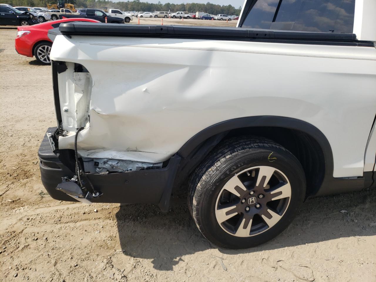 Photo 9 from auction – 2019 HONDA RIDGELINE with VIN 5FPYK2F68KB003891