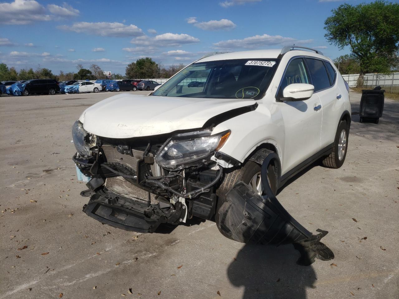 Photo 2 from auction – 2015 NISSAN ROGUE S with VIN 5N1AT2MV6FC917055