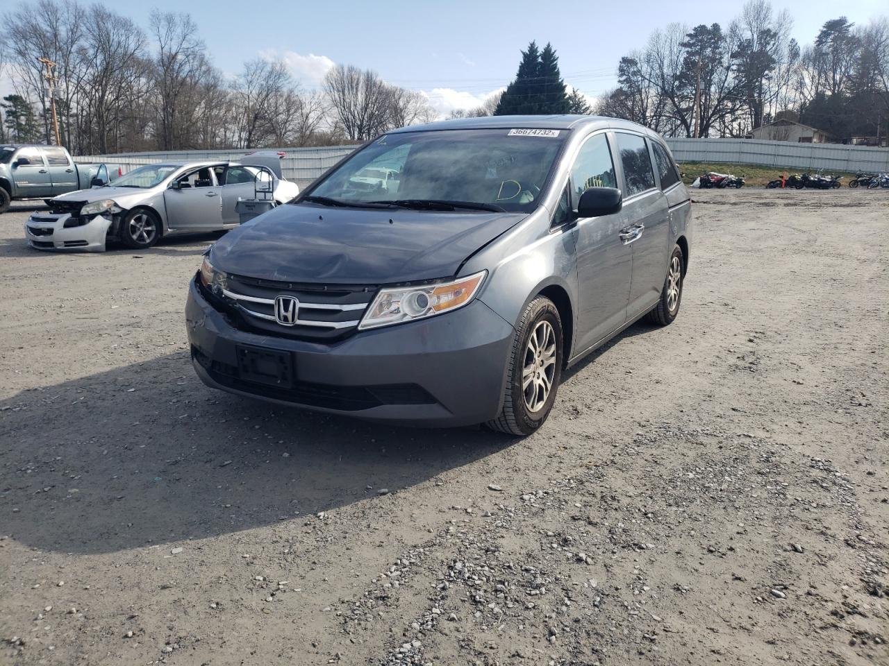 Photo 2 from auction – 2011 HONDA ODYSSEY EX with VIN 5FNRL5H63BB052182