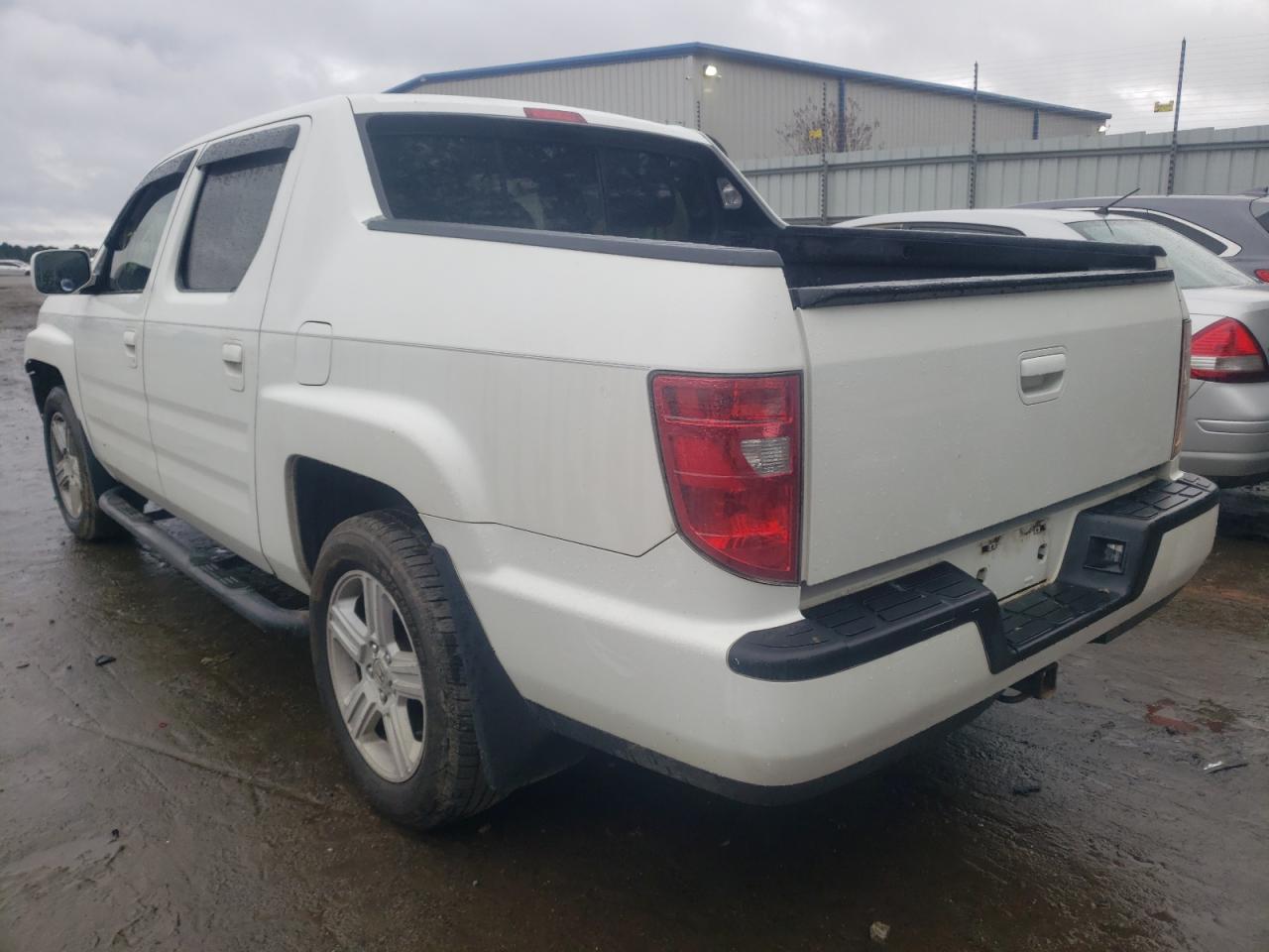 Photo 3 from auction – 2011 HONDA RIDGELINE with VIN 5FPYK1F53BB006148