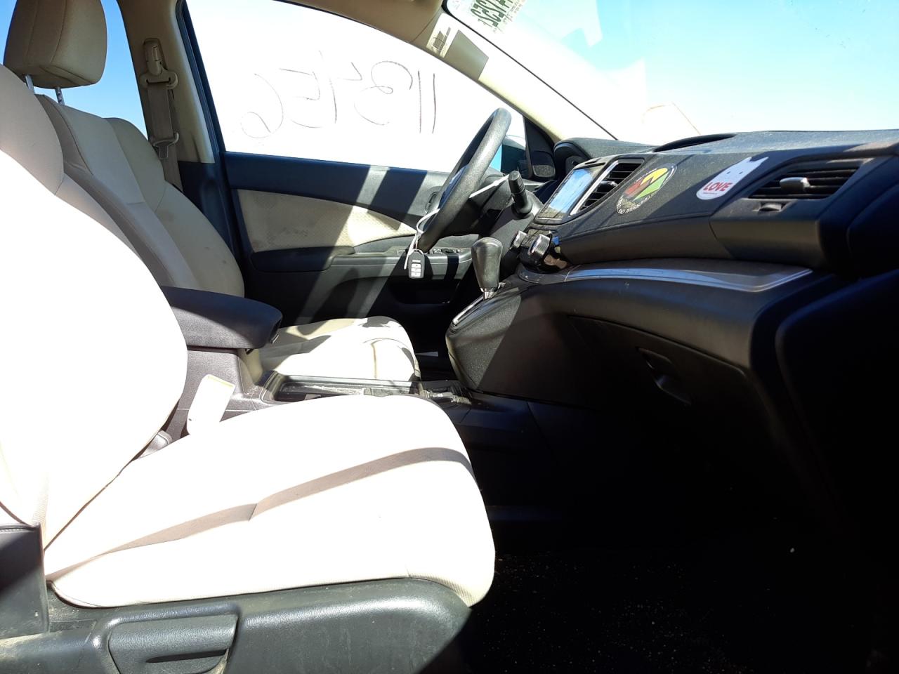 Photo 5 from auction – 2015 HONDA CR-V EX with VIN 2HKRM3H50FH547021