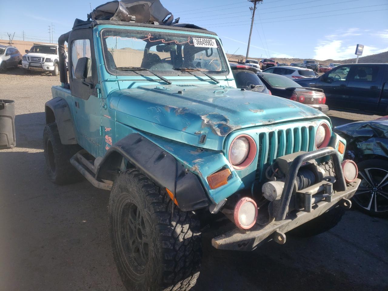 JEEP WRANGLER / 1998 with VIN 1J4FY19S4WP734678 - Photo from auction