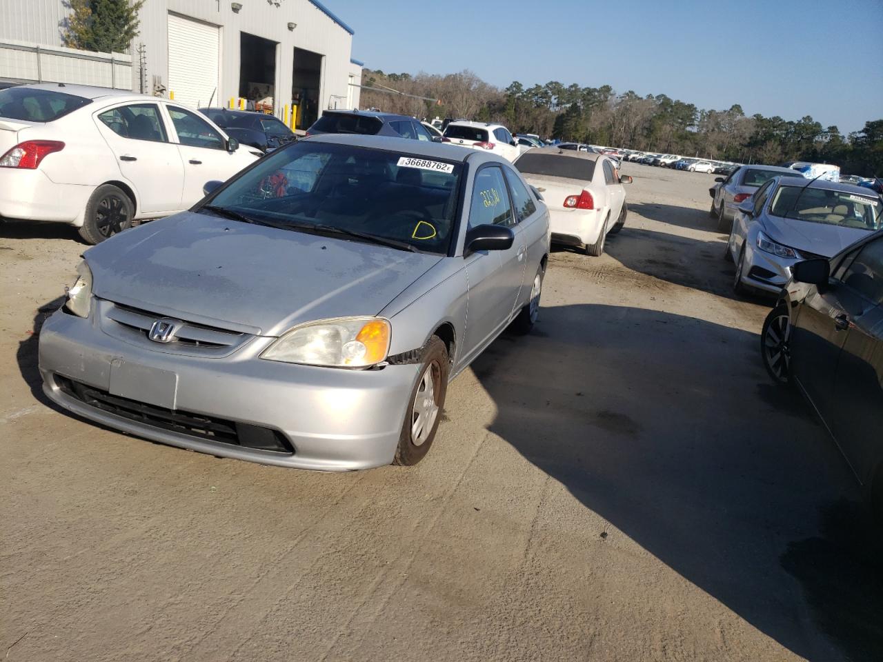 Photo 2 from auction – 2003 HONDA CIVIC LX with VIN 1HGEM225X3L034711