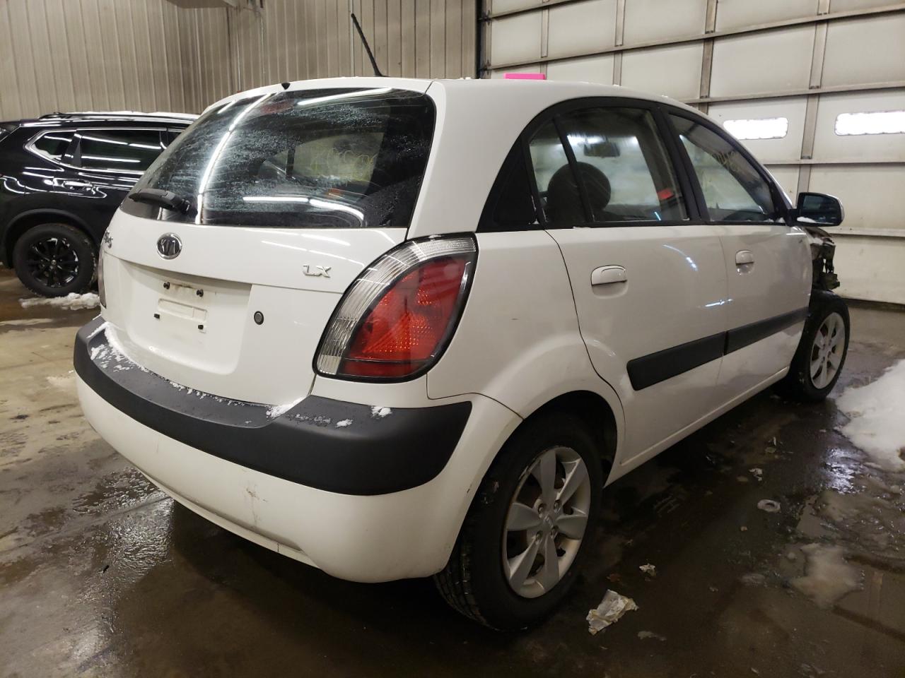 Photo 4 from auction – 2009 KIA RIO 5 SX with VIN KNADE243096519611