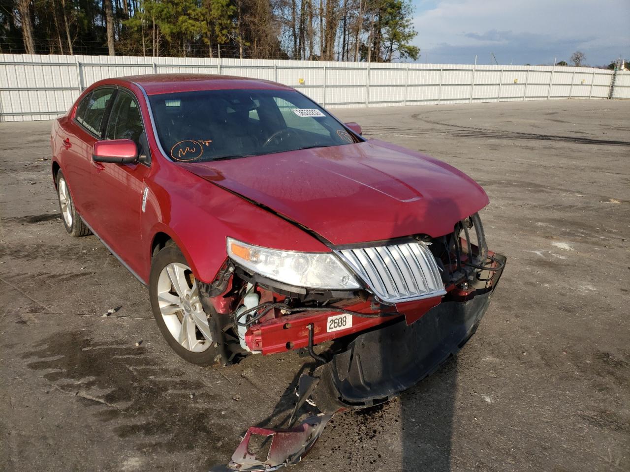 LINCOLN MKS 2012 with VIN 1LNHL9DR5CG800890 - Photo from auction