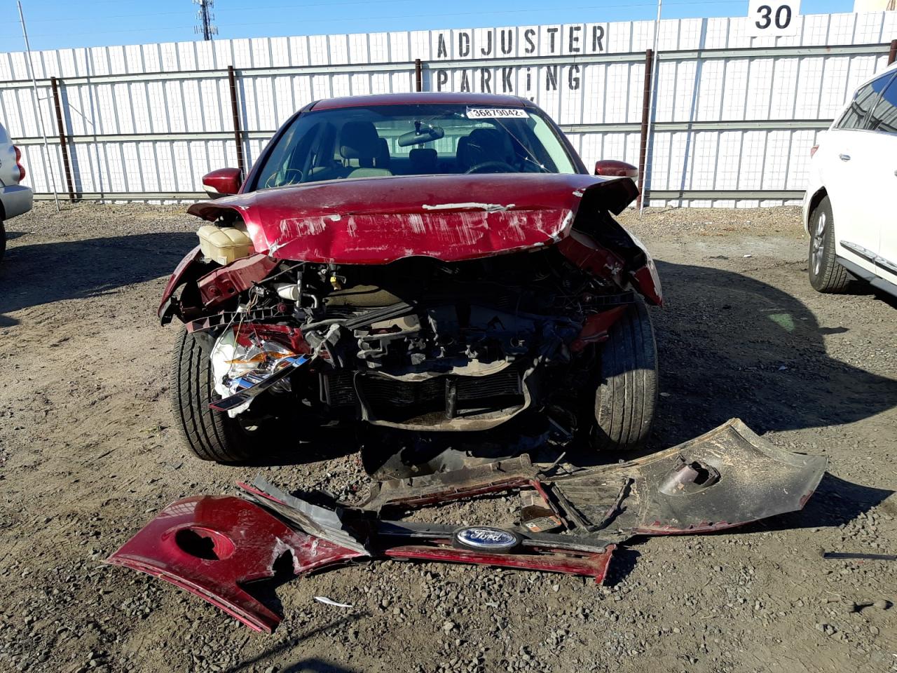 Photo 9 from auction – 2014 FORD FOCUS SE with VIN 1FADP3F27EL367755