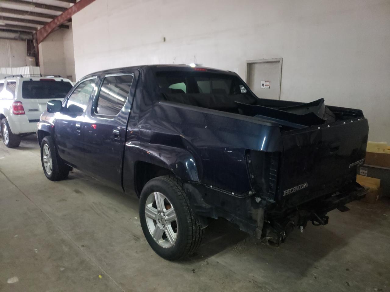 Photo 3 from auction – 2010 HONDA RIDGELINE with VIN 5FPYK1F58AB002708