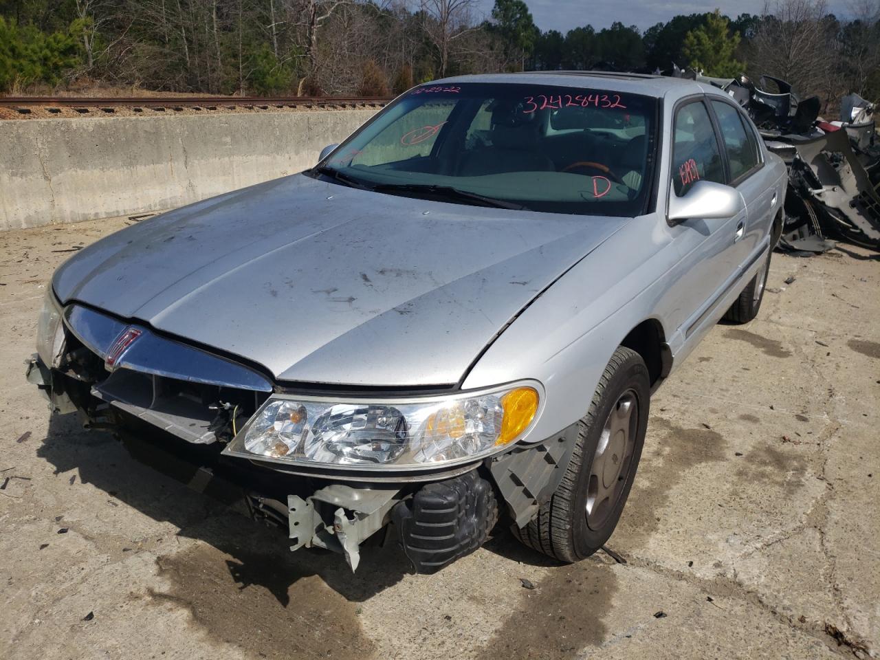 Photo 2 from auction – 2002 LINCOLN CONTINENTA with VIN 1LNHM97V82Y644746