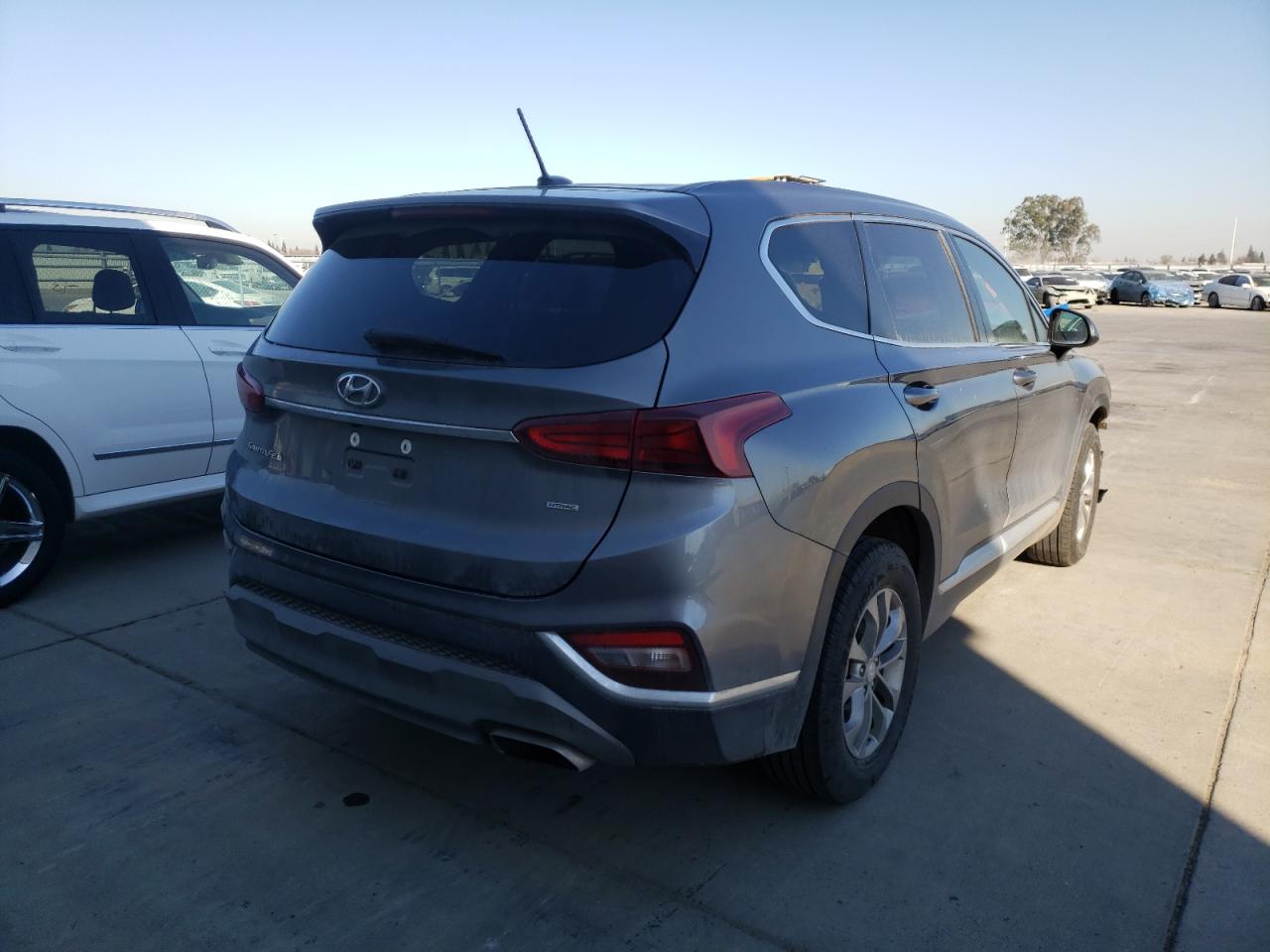 Photo 4 from auction – 2019 HYUNDAI SANTA FE S with VIN 5NMS2CAD3KH010868