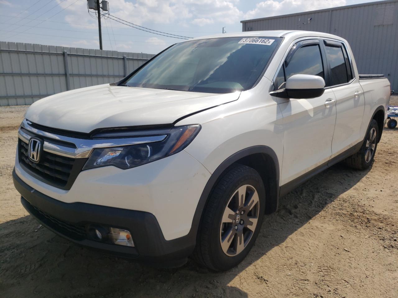 Photo 2 from auction – 2019 HONDA RIDGELINE with VIN 5FPYK2F68KB003891