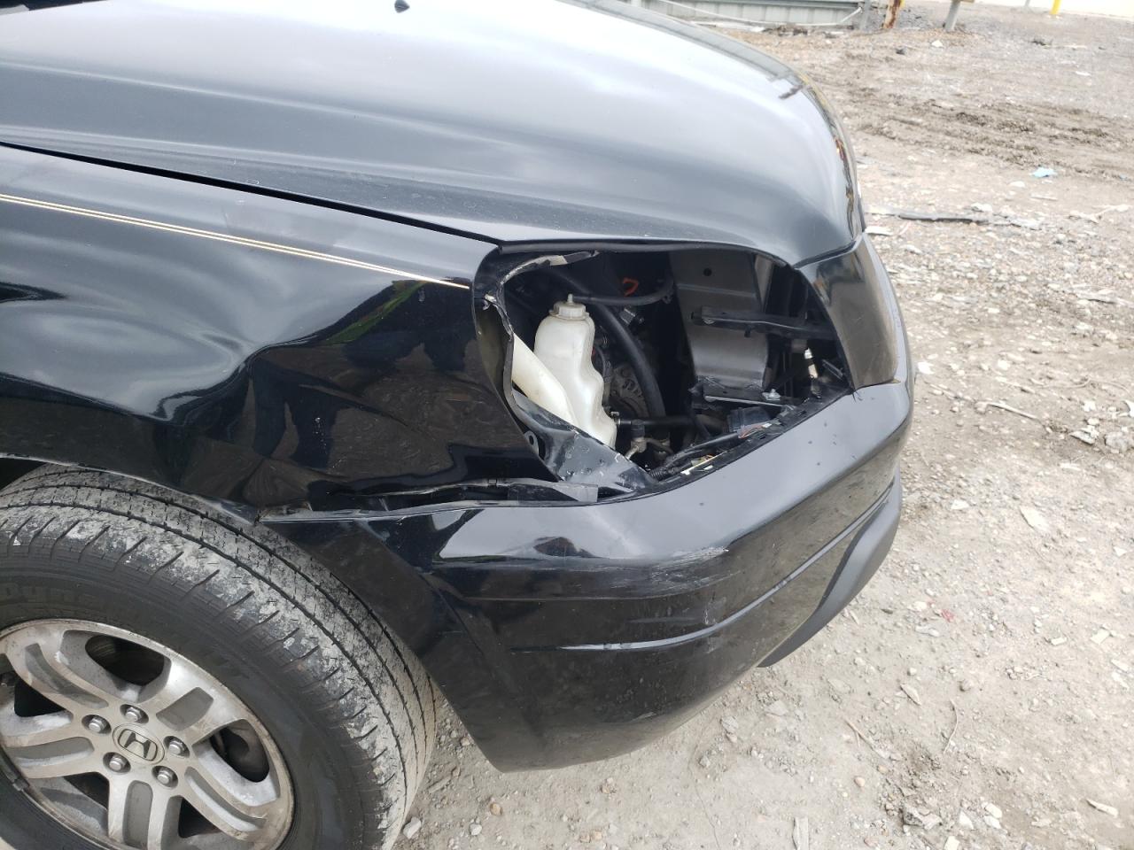 Photo 9 from auction – 2005 HONDA PILOT EXL with VIN 5FNYF18565B043080