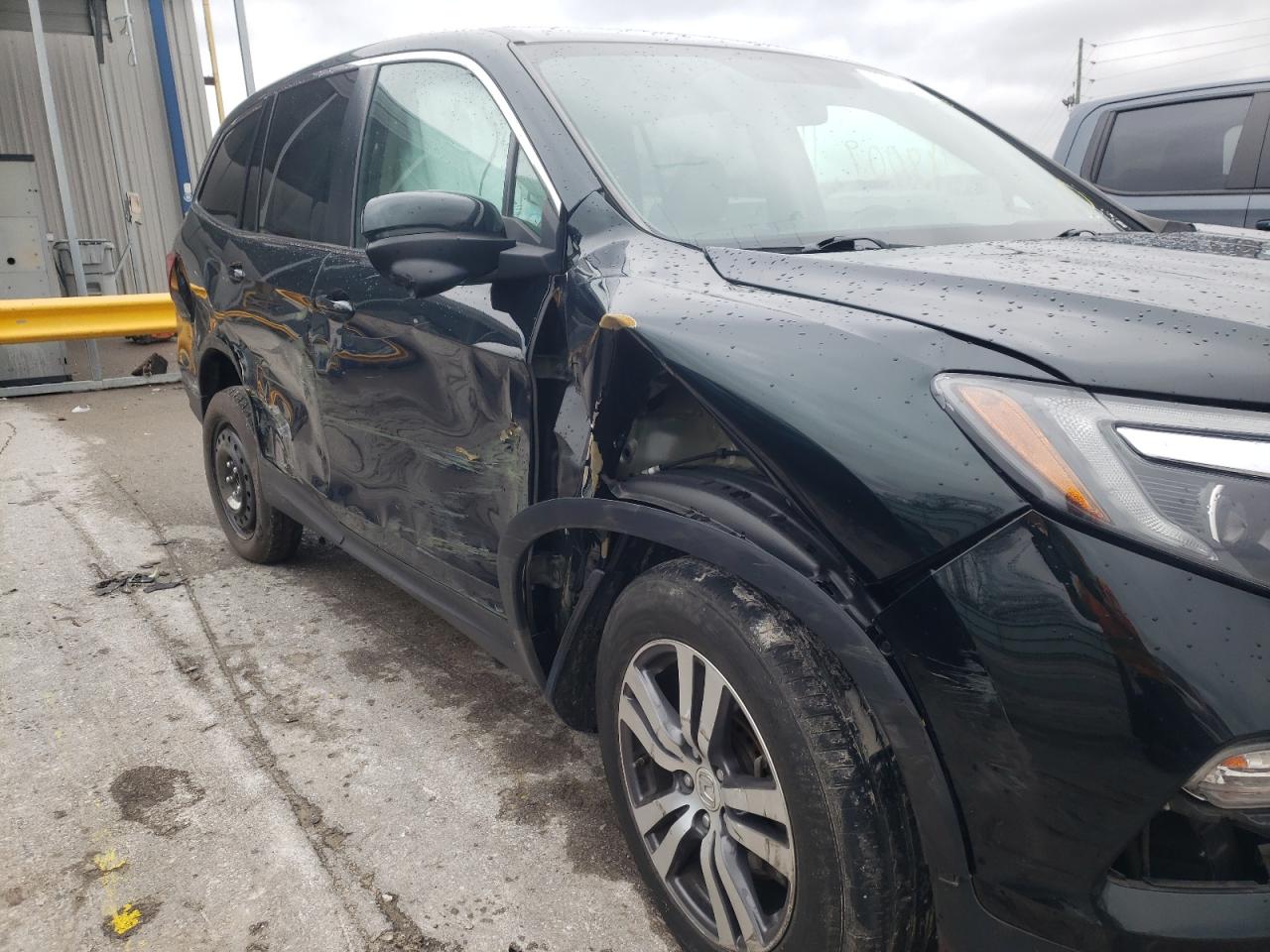 Photo 9 from auction – 2017 HONDA PILOT EXL with VIN 5FNYF5H89HB025419