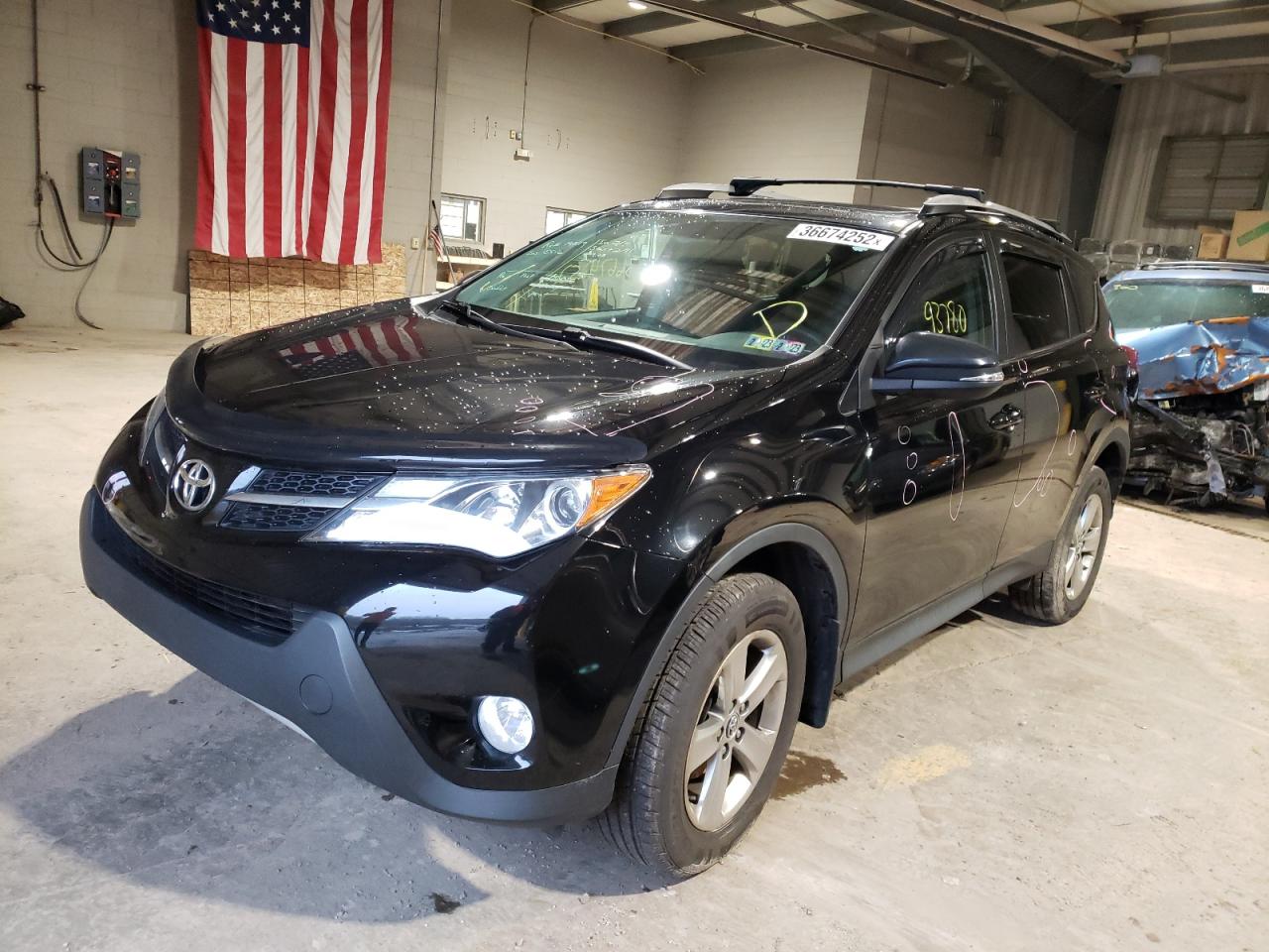 Photo 2 from auction – 2015 TOYOTA RAV4 XLE with VIN 2T3RFREV9FW341481