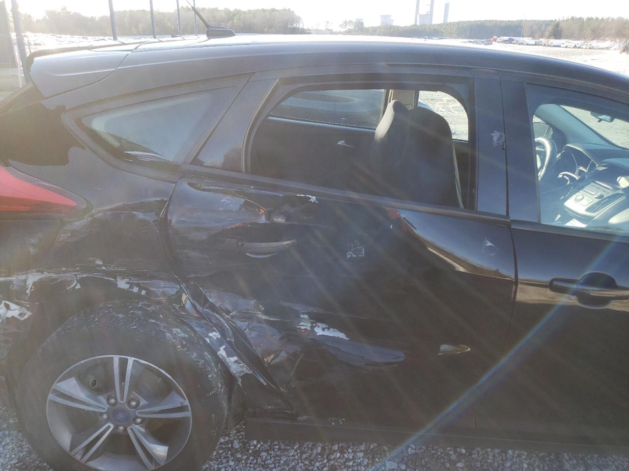 Photo 9 from auction – 2016 FORD FOCUS SE with VIN 1FADP3KE2GL371120